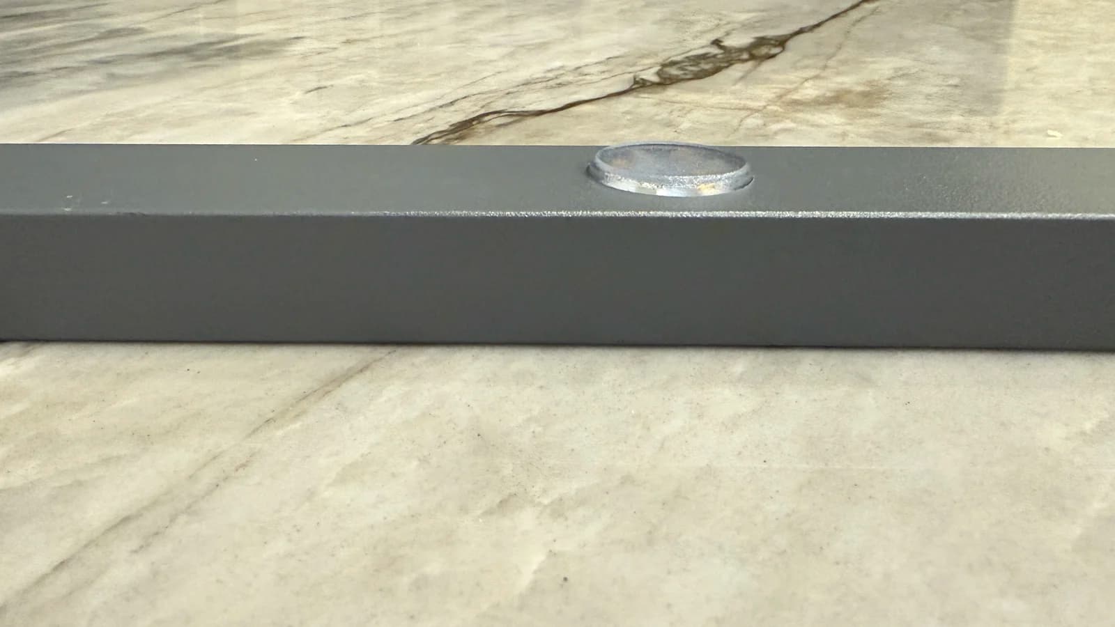 Side profile of a TruLight diffused node installed in aluminum track